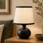 Black Round-Base Table Lamp with Ivory Shade — Interior lifestyle view