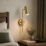 Adjustable Gold Reading Wall Light with Switch — in an interior setting