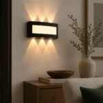 Black Up and Down LED Wall Light, 6W — in an interior setting