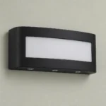 Black Up and Down LED Wall Light, 6W — complete fixture in an interior setting