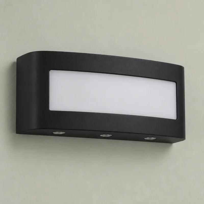 Black Up and Down LED Wall Light, 6W — complete fixture in an interior setting