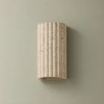 Fluted Travertine Up and Down Wall Light — complete fixture in an interior setting