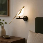 Gold Bird LED Wall Sconce, One Bird — in an interior setting