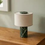 Green Marble Table Lamp with Fabric Drum Shade — complete fixture in an interior setting