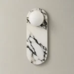 Marble and Opal Glass Wall Sconce, One Globe — complete fixture in an interior setting