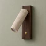 Travertine Reading Wall Light with Walnut Backplate — complete fixture in an interior setting